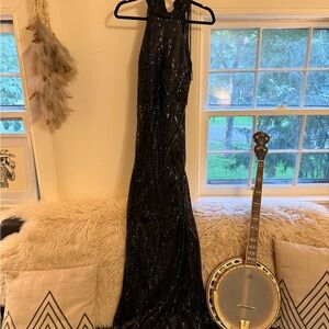 Elegant Black Sequin Gown with beaded shoulder drapes